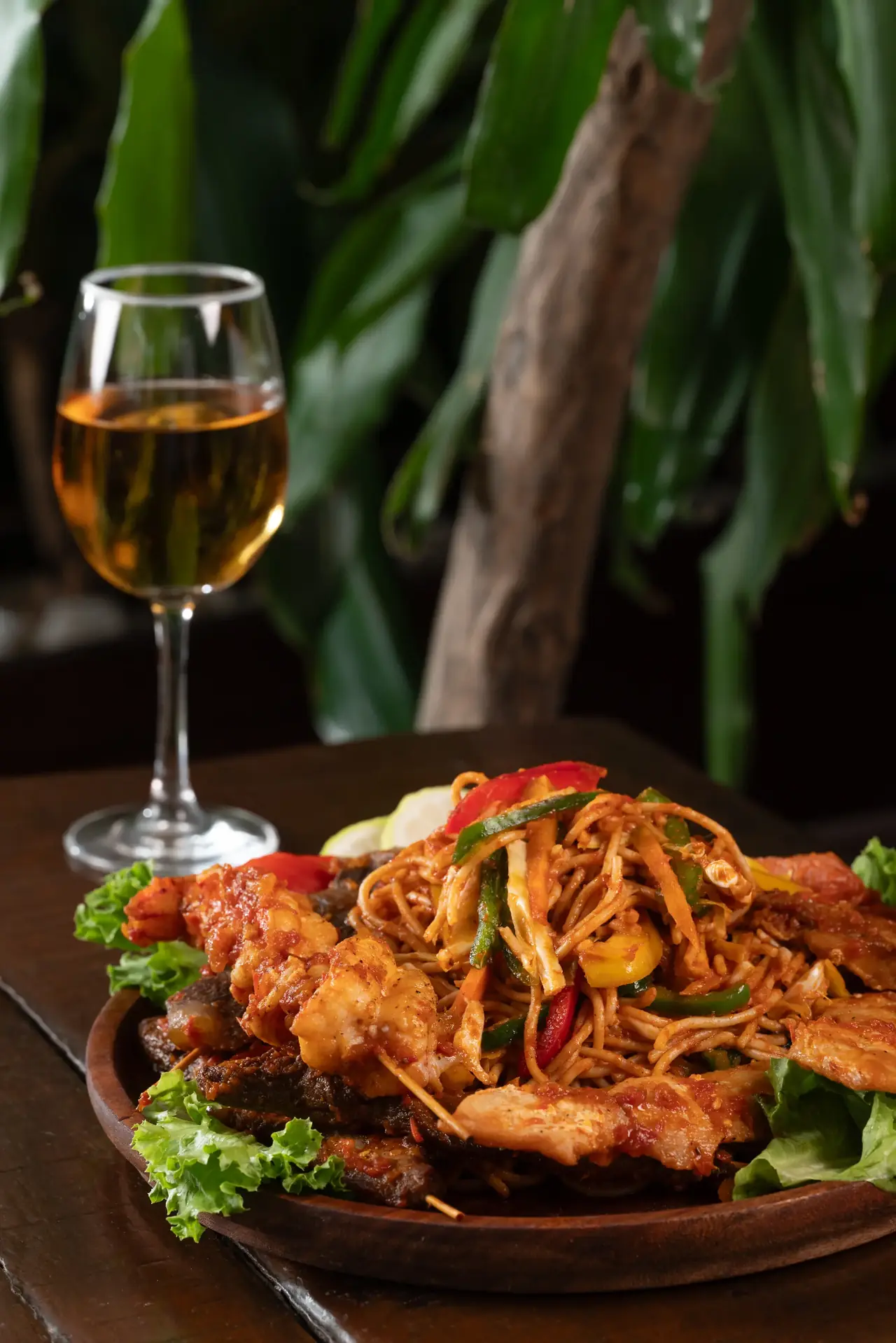 A Nigerian food spread served with wine at Terra Kulture Restaurant